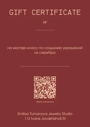 The studio's gift certificate: a deep red card with a QR code