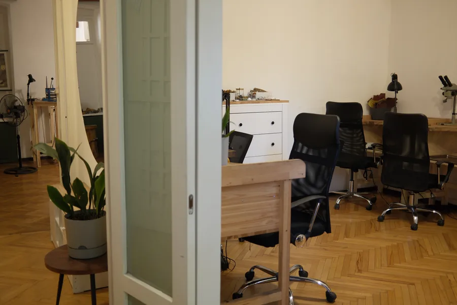 The doorway through to the studio's second room and its workstations